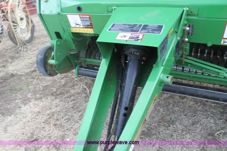 image for item F3466 2012 John Deere 568 round baler