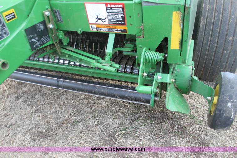 image for item F3466 2012 John Deere 568 round baler