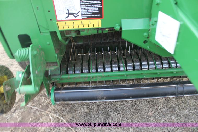 image for item F3466 2012 John Deere 568 round baler