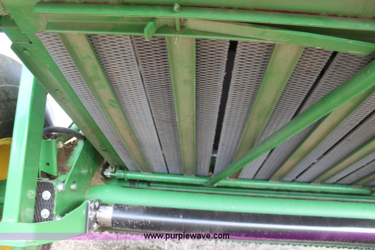 image for item F3466 2012 John Deere 568 round baler