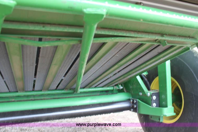 image for item F3466 2012 John Deere 568 round baler