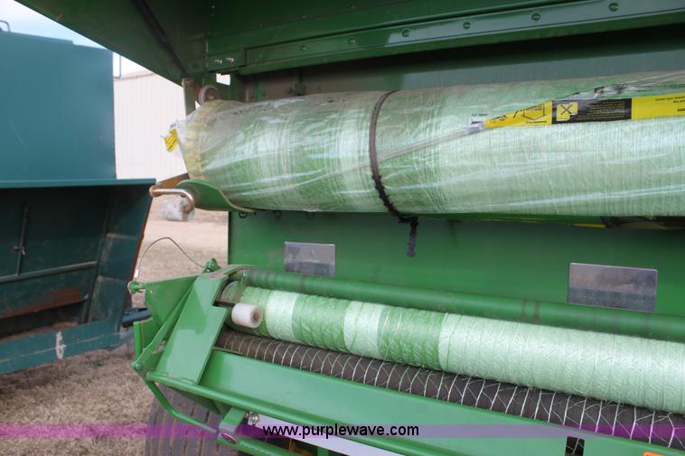 image for item F3466 2012 John Deere 568 round baler
