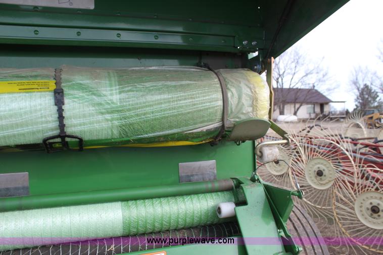 image for item F3466 2012 John Deere 568 round baler