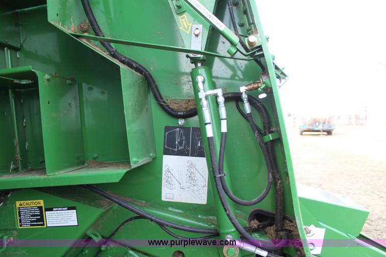 image for item F3466 2012 John Deere 568 round baler