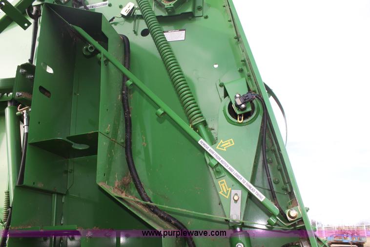 image for item F3466 2012 John Deere 568 round baler