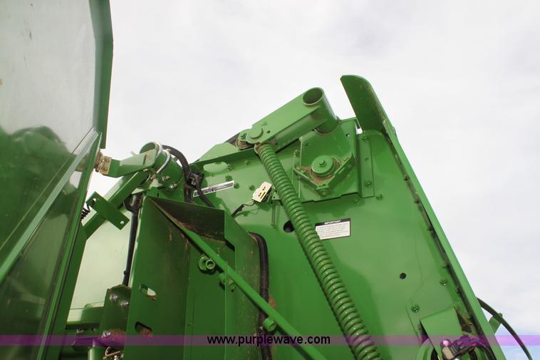image for item F3466 2012 John Deere 568 round baler