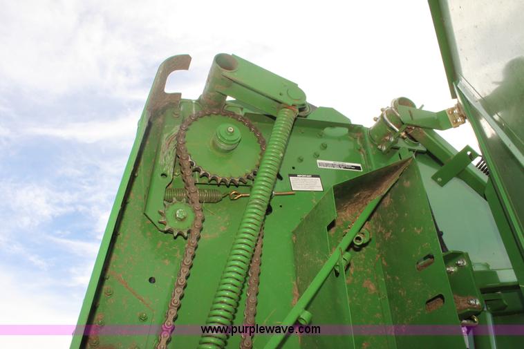 image for item F3466 2012 John Deere 568 round baler