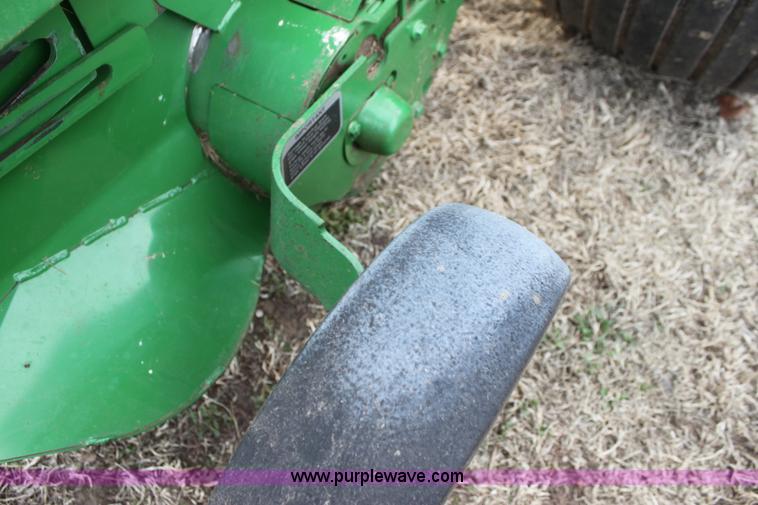 image for item F3466 2012 John Deere 568 round baler