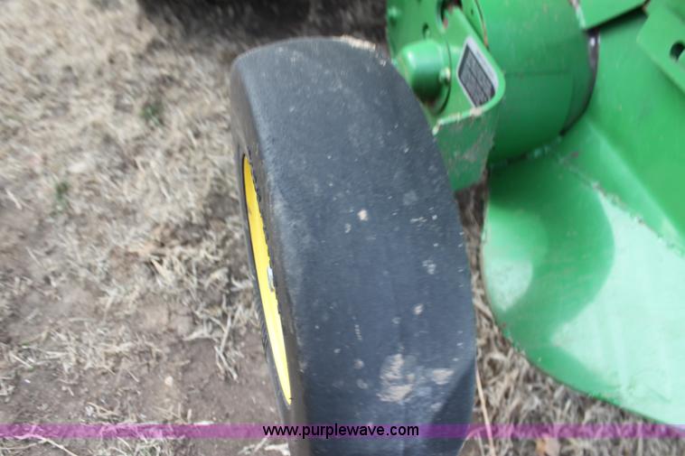 image for item F3466 2012 John Deere 568 round baler