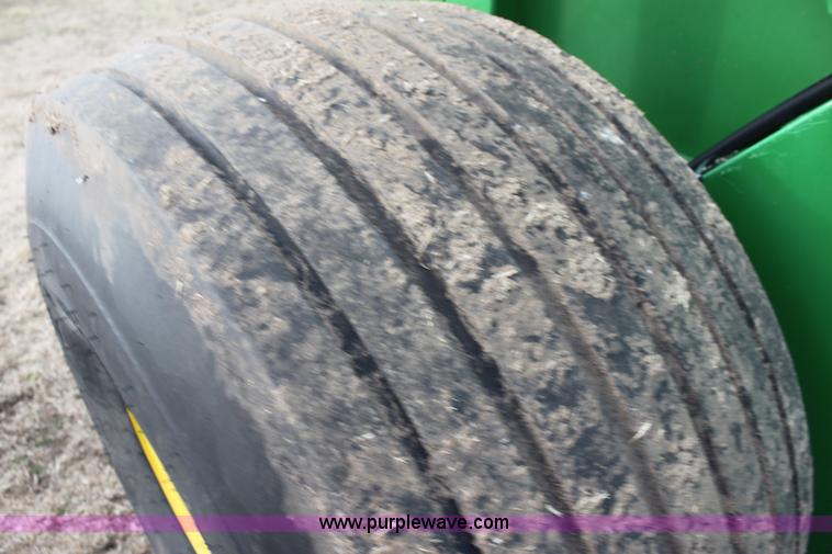 image for item F3466 2012 John Deere 568 round baler