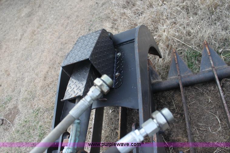 image for item L6510 Caterpillar root grapple bucket