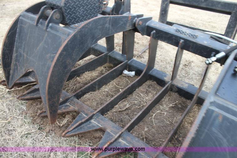 image for item L6510 Caterpillar root grapple bucket