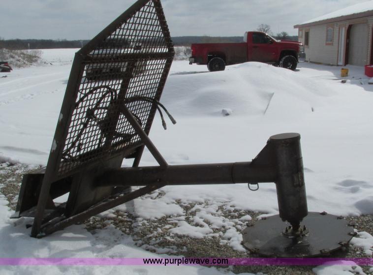 image for item AC9763 Hydraulic tree saw skid steer attachment