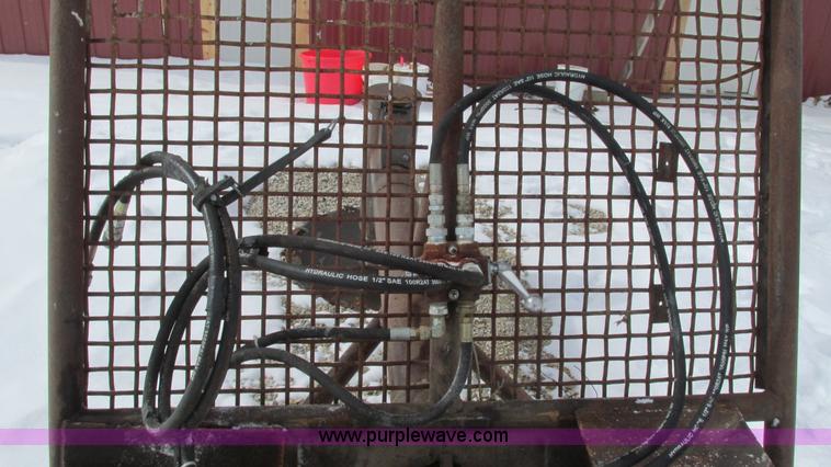 image for item AC9763 Hydraulic tree saw skid steer attachment