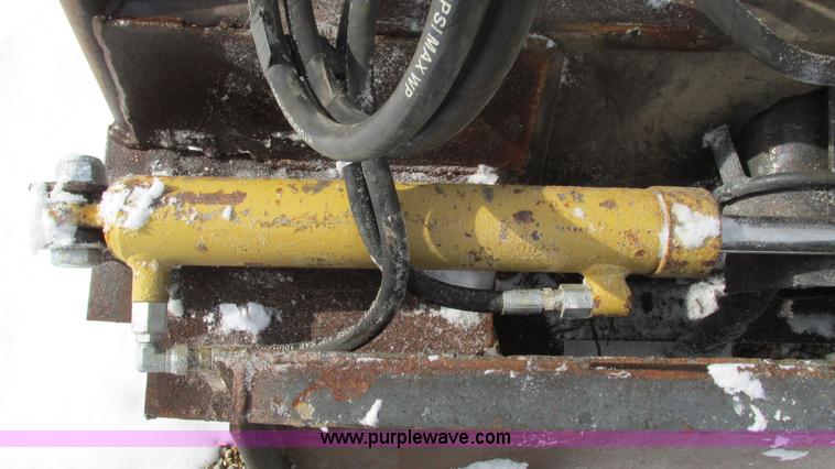 image for item AC9763 Hydraulic tree saw skid steer attachment