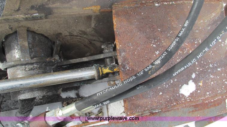 image for item AC9763 Hydraulic tree saw skid steer attachment