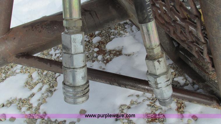 image for item AC9763 Hydraulic tree saw skid steer attachment