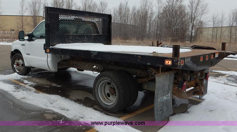 image for item I5096 2005 Ford F350 Super Duty XL flatbed pickup truck