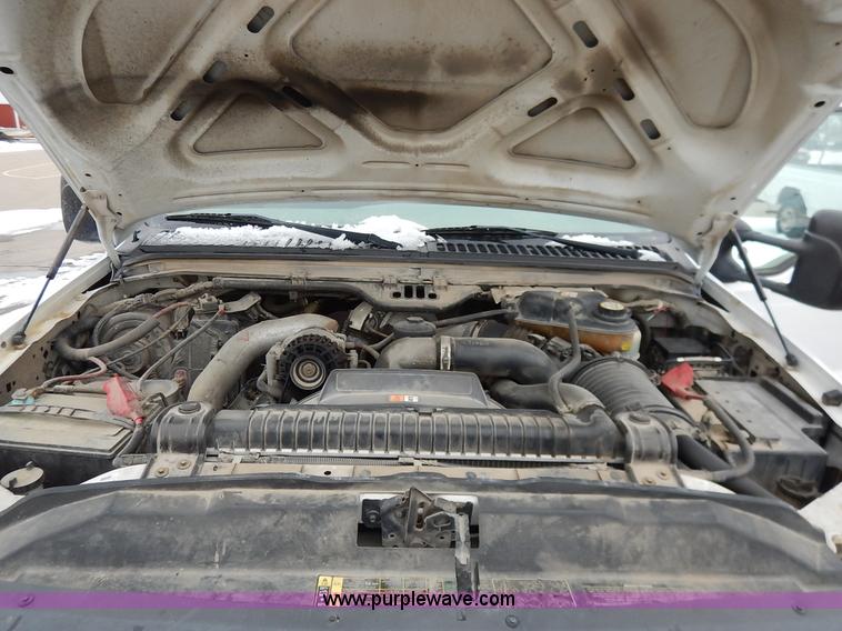 image for item I5096 2005 Ford F350 Super Duty XL flatbed pickup truck