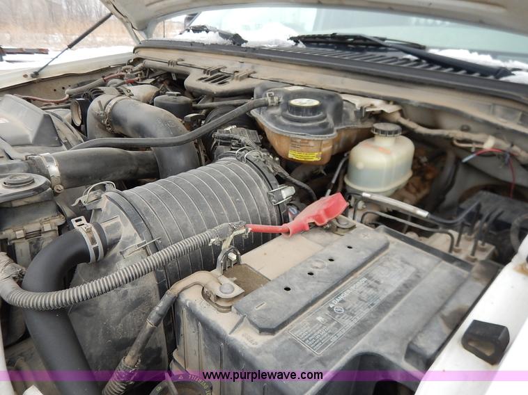 image for item I5096 2005 Ford F350 Super Duty XL flatbed pickup truck