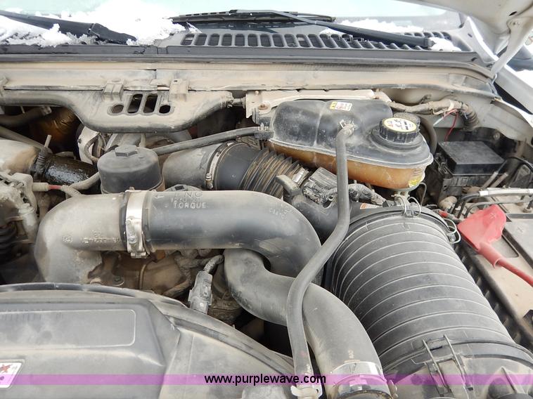 image for item I5096 2005 Ford F350 Super Duty XL flatbed pickup truck