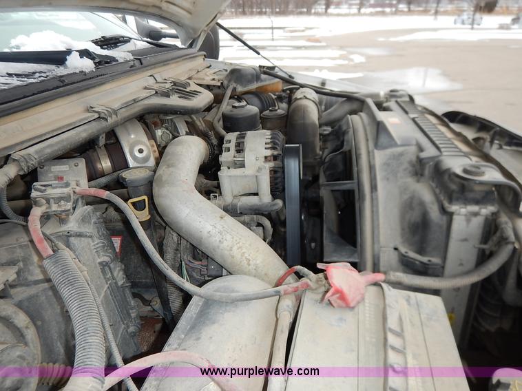 image for item I5096 2005 Ford F350 Super Duty XL flatbed pickup truck