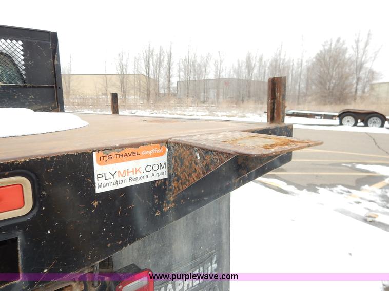 image for item I5096 2005 Ford F350 Super Duty XL flatbed pickup truck