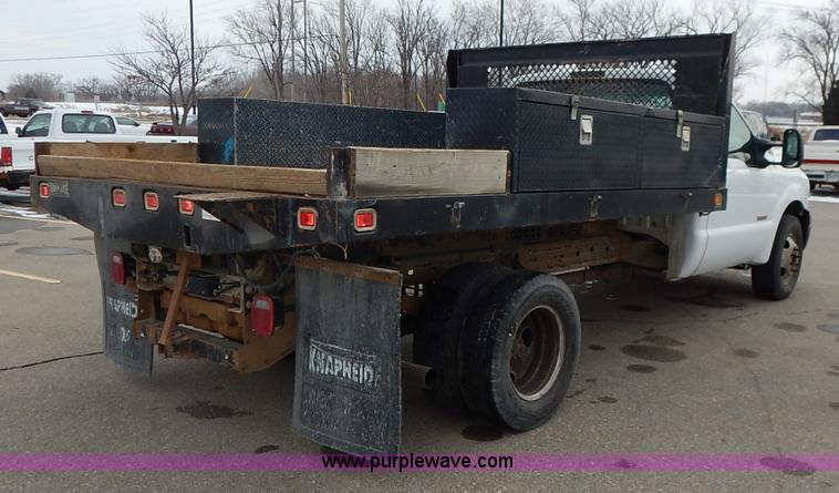 image for item I5097 2005 Ford F350 Super Duty XL flatbed pickup truck
