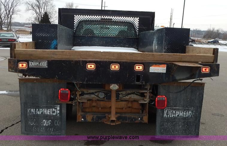 image for item I5097 2005 Ford F350 Super Duty XL flatbed pickup truck