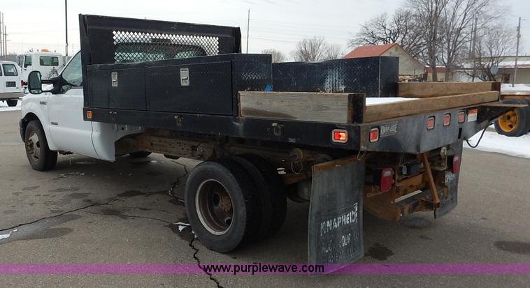 image for item I5097 2005 Ford F350 Super Duty XL flatbed pickup truck