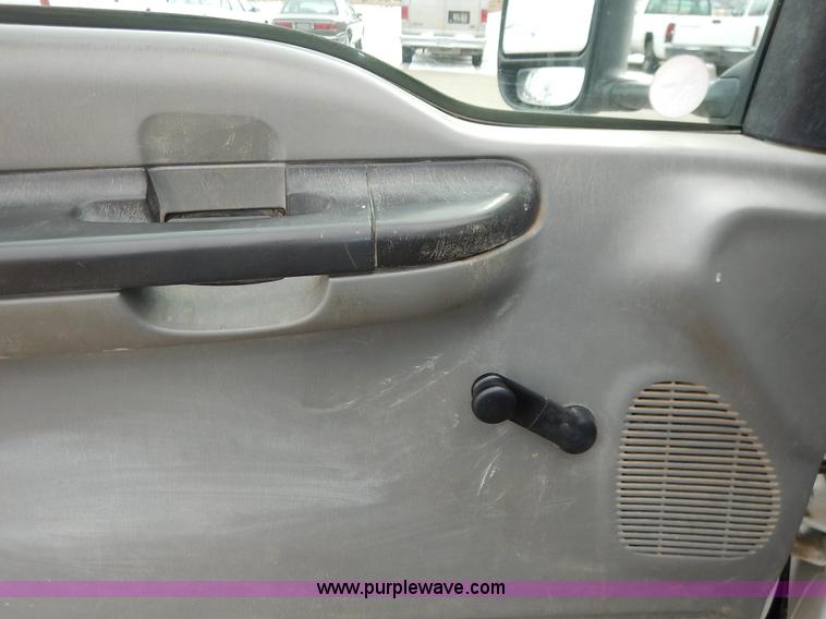 image for item I5097 2005 Ford F350 Super Duty XL flatbed pickup truck