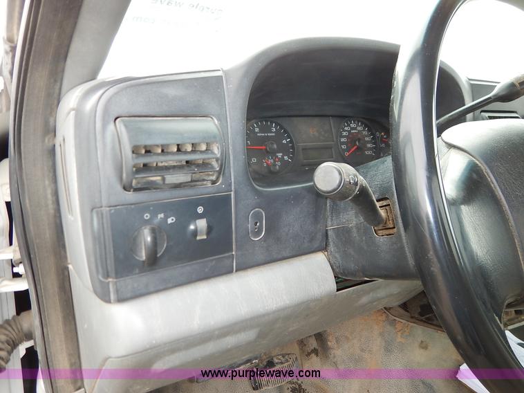 image for item I5097 2005 Ford F350 Super Duty XL flatbed pickup truck