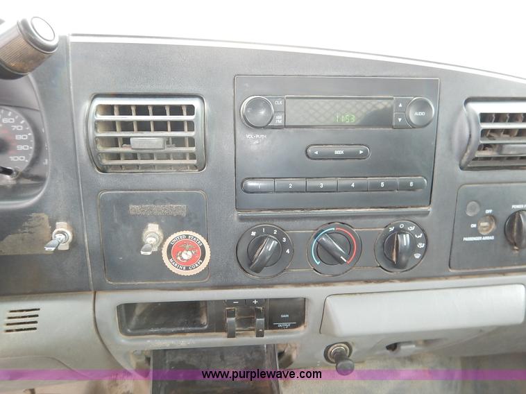 image for item I5097 2005 Ford F350 Super Duty XL flatbed pickup truck