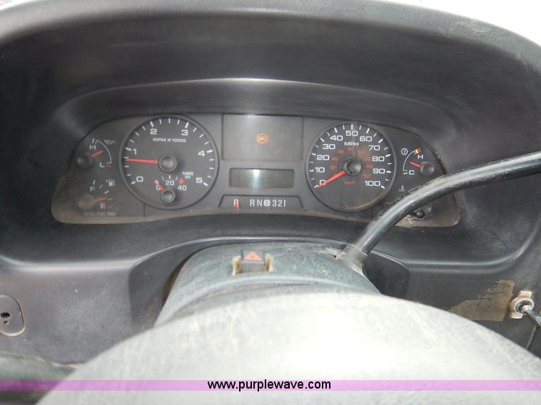 image for item I5097 2005 Ford F350 Super Duty XL flatbed pickup truck