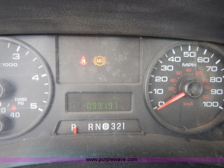 image for item I5097 2005 Ford F350 Super Duty XL flatbed pickup truck