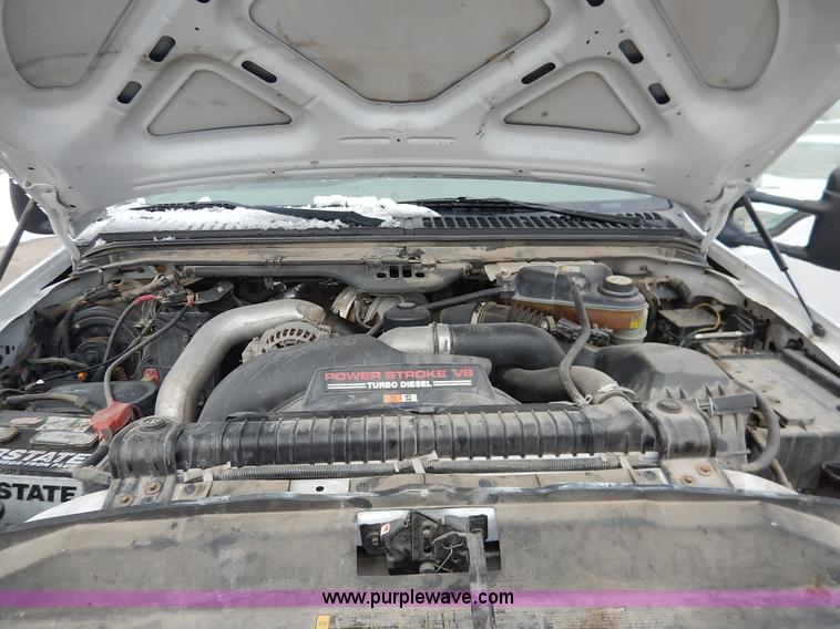 image for item I5097 2005 Ford F350 Super Duty XL flatbed pickup truck