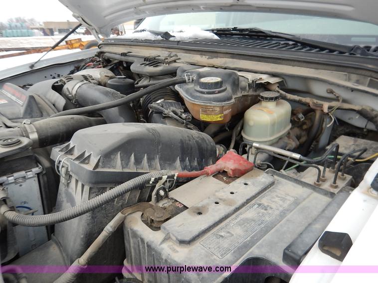 image for item I5097 2005 Ford F350 Super Duty XL flatbed pickup truck