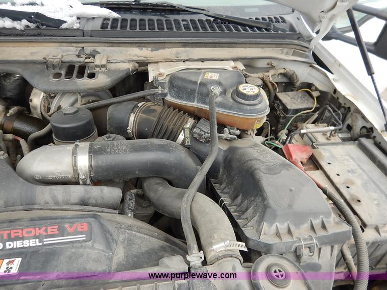 image for item I5097 2005 Ford F350 Super Duty XL flatbed pickup truck