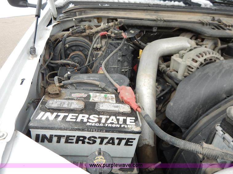 image for item I5097 2005 Ford F350 Super Duty XL flatbed pickup truck