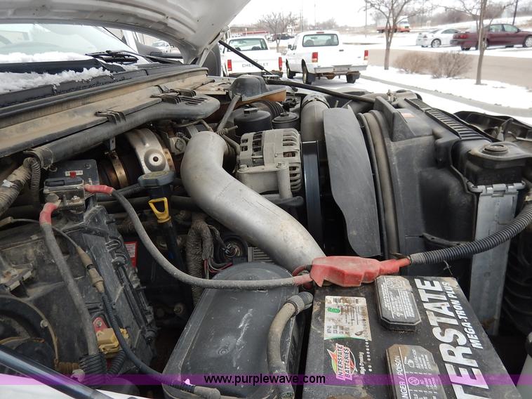 image for item I5097 2005 Ford F350 Super Duty XL flatbed pickup truck