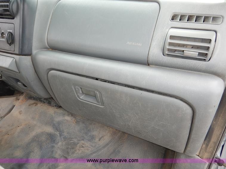 image for item I5097 2005 Ford F350 Super Duty XL flatbed pickup truck