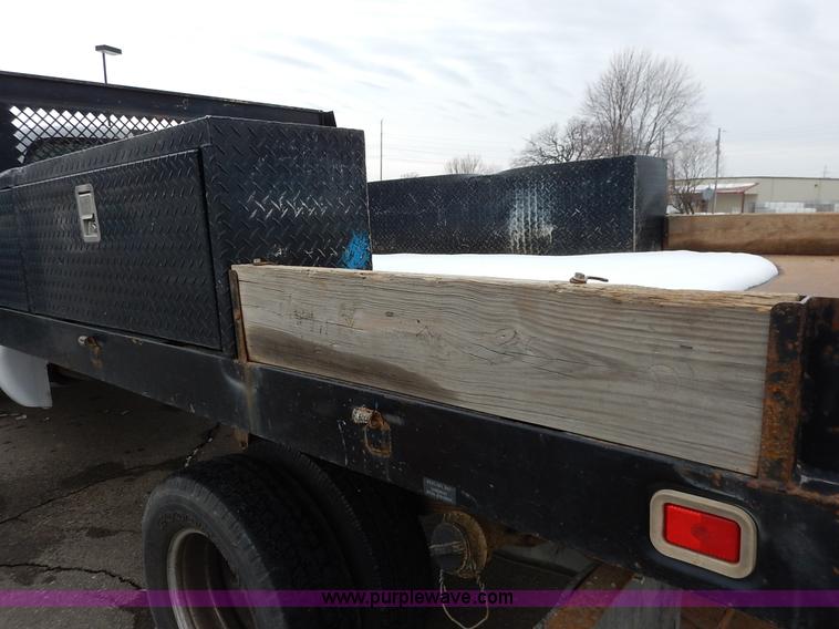 image for item I5097 2005 Ford F350 Super Duty XL flatbed pickup truck