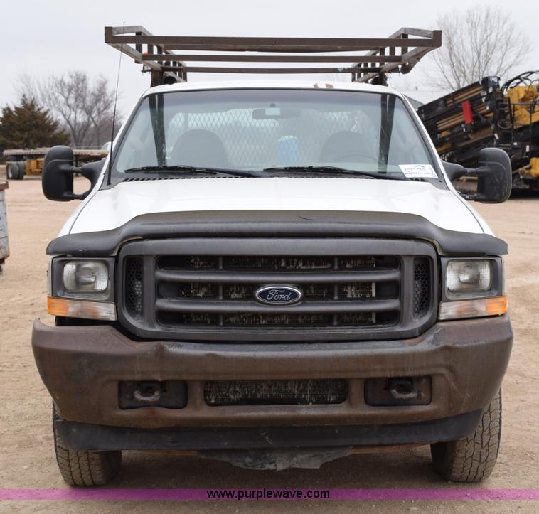 image for item K2321 2003 Ford F250 Super Duty XL SuperCab flatbed pickup truck