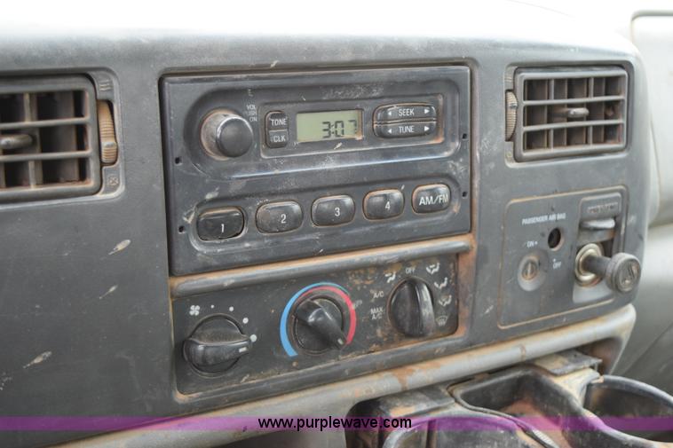 image for item K2321 2003 Ford F250 Super Duty XL SuperCab flatbed pickup truck