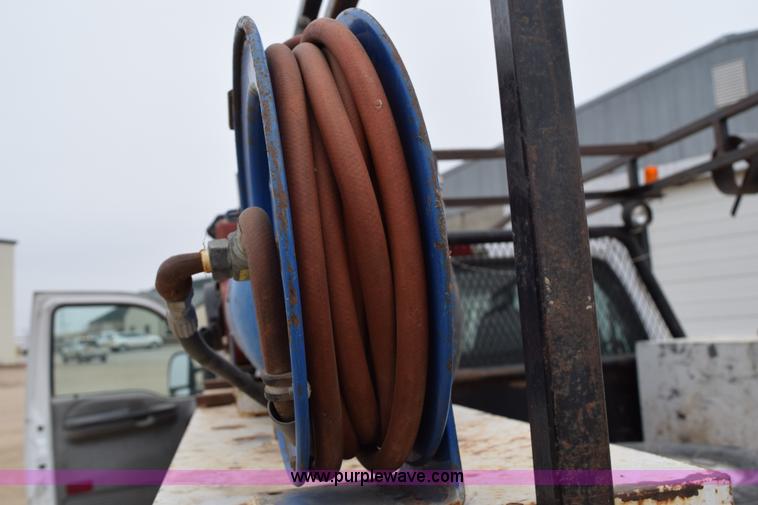 image for item K2321 2003 Ford F250 Super Duty XL SuperCab flatbed pickup truck