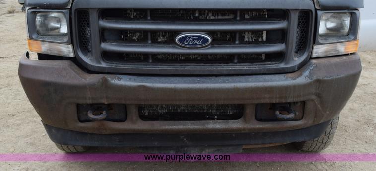 image for item K2321 2003 Ford F250 Super Duty XL SuperCab flatbed pickup truck