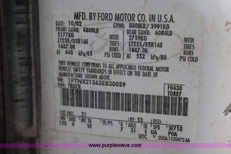 image for item K2321 2003 Ford F250 Super Duty XL SuperCab flatbed pickup truck