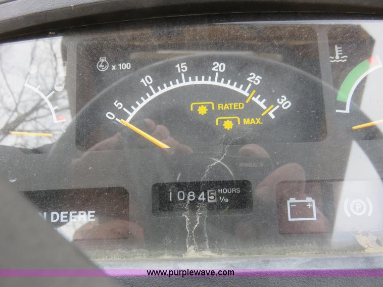 image for item K7219 1994 John Deere 770 utility tractor