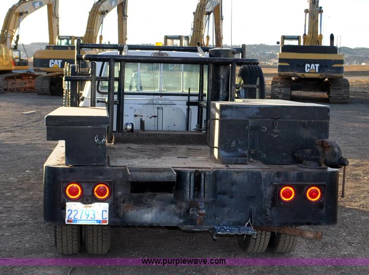 image for item F2200 1977 Ford F350 utility truck