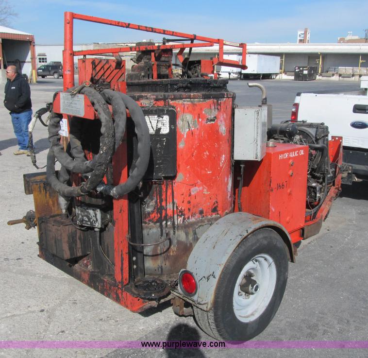 image for item F8964 1999 Crafco Super Shot SS125 melter applicator